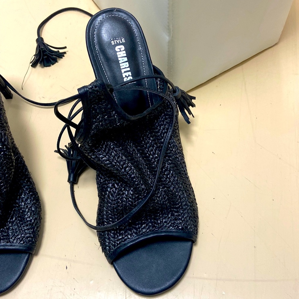 Black woven peep toes with tassels